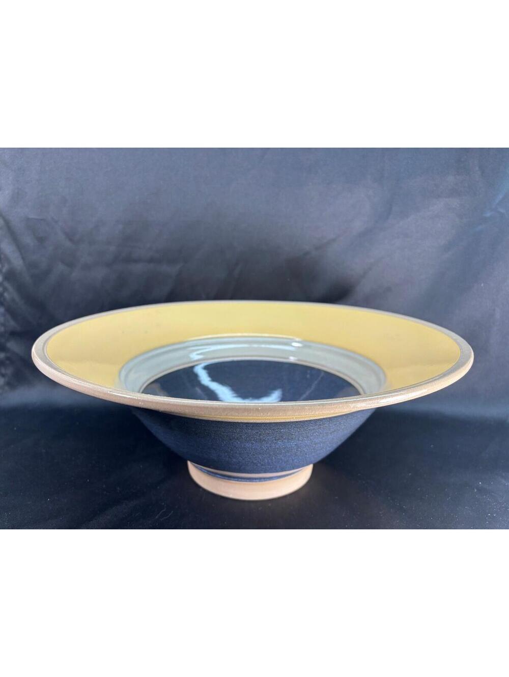 160 - handmade studio art pottery bowl wide yellow rim & blue interior glaze